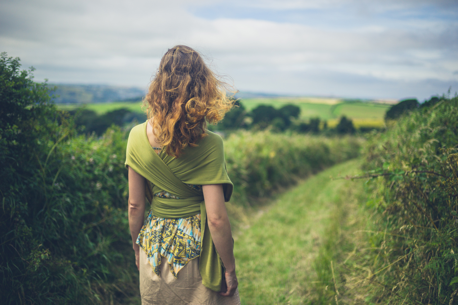 Woman Walking in Countryside
